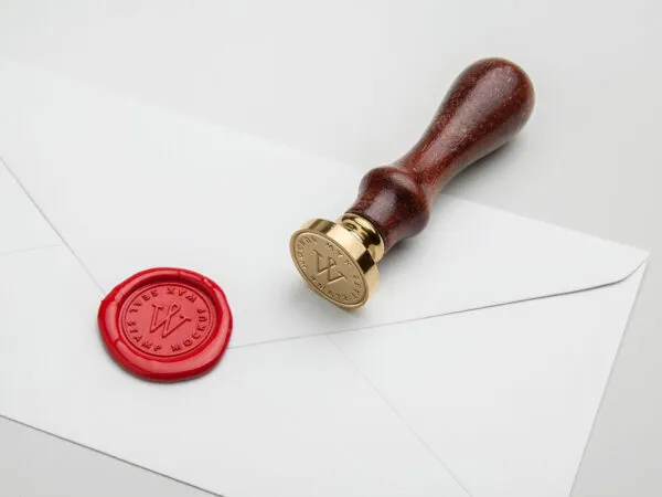 Wooden Wax Seal Stamp with a Sealed Envelope Mockup 1 1