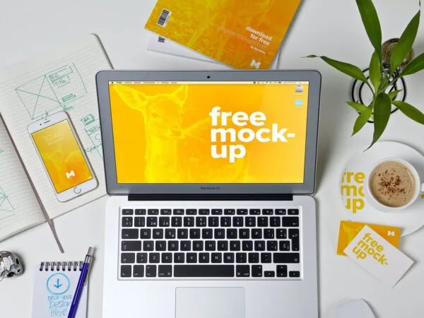 Workspace Mockup Featuring MacBook and Business Cards 1