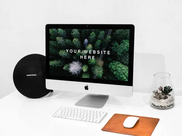 Workspace iMac Mockup Featuring a Mouse and a Keyboard 1