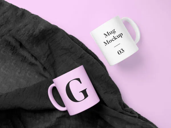 a Pair of Enamel Mugs Laying on the Floor Mockup 1