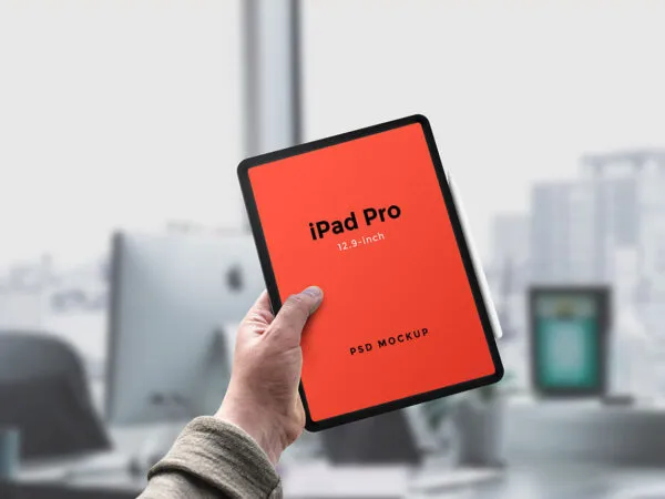 iPad Pro with Apple Pencil Held by a Hand Mockup 1