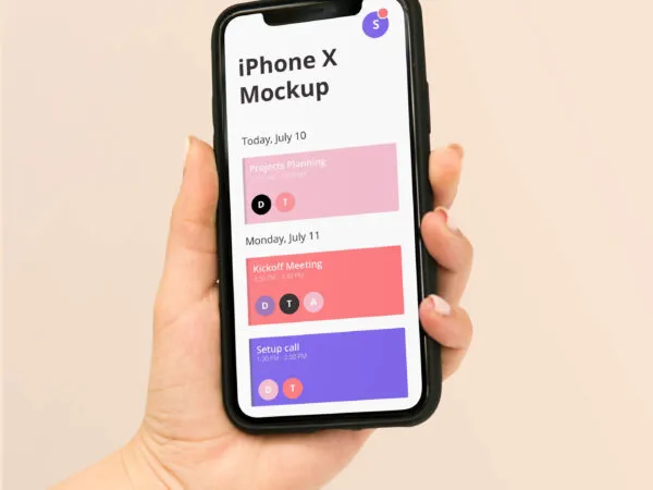 iPhone X in a Womans Hand Mockup 1