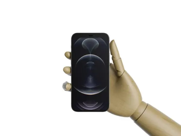 ٍiPhone 12 in a Wooden Hand Mockup 1